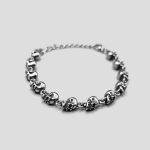 دستبند اسکلتی استیل مدل Twelve Skulls کد Njd-938d4