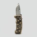 فندک اتمی و چاقو دستی اسکلتی مدل Skull of Lights کد Sdg-404M0360