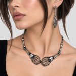 ست گردنبند و گوشواره استیل دست اسکلتی طرح عشق جاودان کد ICH-26F0656 - Image 2